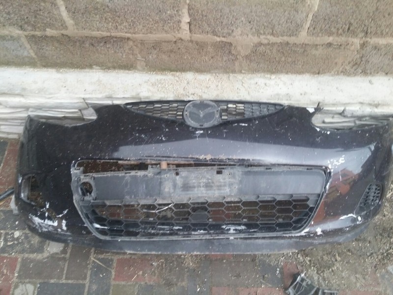 Бампер передний Mazda 2 хэтчбек 2011 г.  1.5 л бензин Одесса