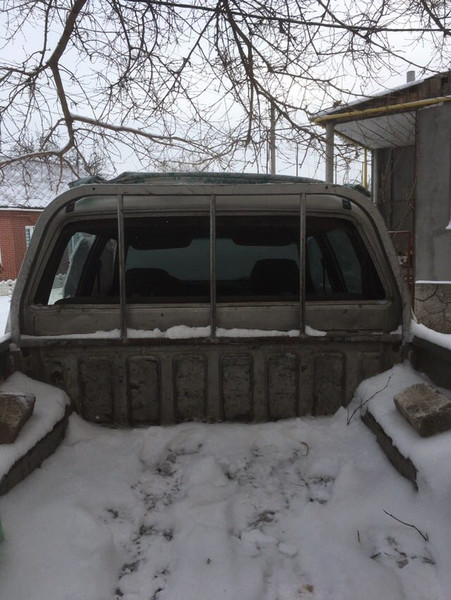 Стекло заднее Mitsubishi L 200  2004 2.5 Дизель Запорожье