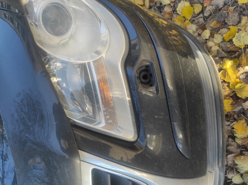 Форсунка с крышкой омывателя левой фары Volkswagen Touran універсал 2007 р.  1.4 л бензин Новомосковськ