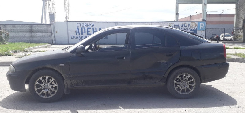 Задні ліві двері Mitsubishi Carisma  2002 хетчбек 1.6 Бензин 