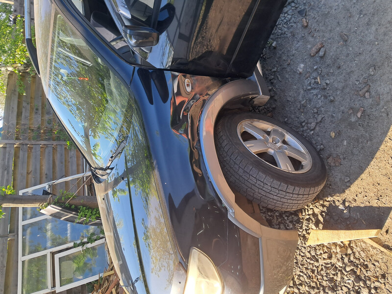 Крыло переднее левое Mitsubishi Outlander 2005 г.  2.4 л бензин Буча