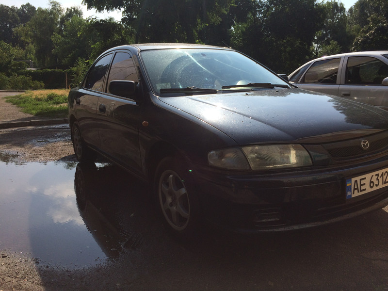 Підкрилки Mazda 323  1997 1.5 Бензин 