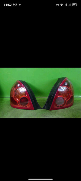 Задние фонари 2 шт рест Nissan Almera N16  2004 хэтчбек 1.5 Бензин Киев