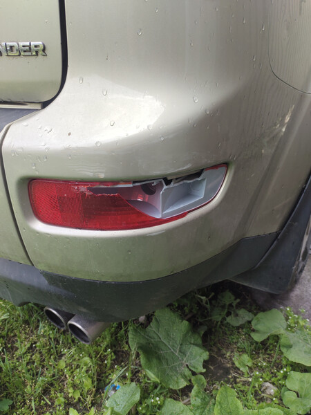 Фонарь правый в бампер (туманка) Mitsubishi Outlander XL  2006 2.0 Дизель Каменское