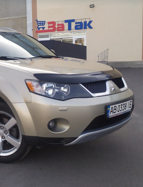 Бампер передний бежевый Mitsubishi Outlander XL  2007 2.2 Дизель Житомир