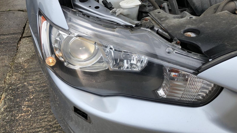 Крышка омывателя фар Mitsubishi Lancer X  2011 1.6 Бензин Житомир