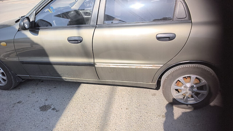 Молдинг задньої лівої дверки Daewoo Lanos  2004 1.5 Бензин 