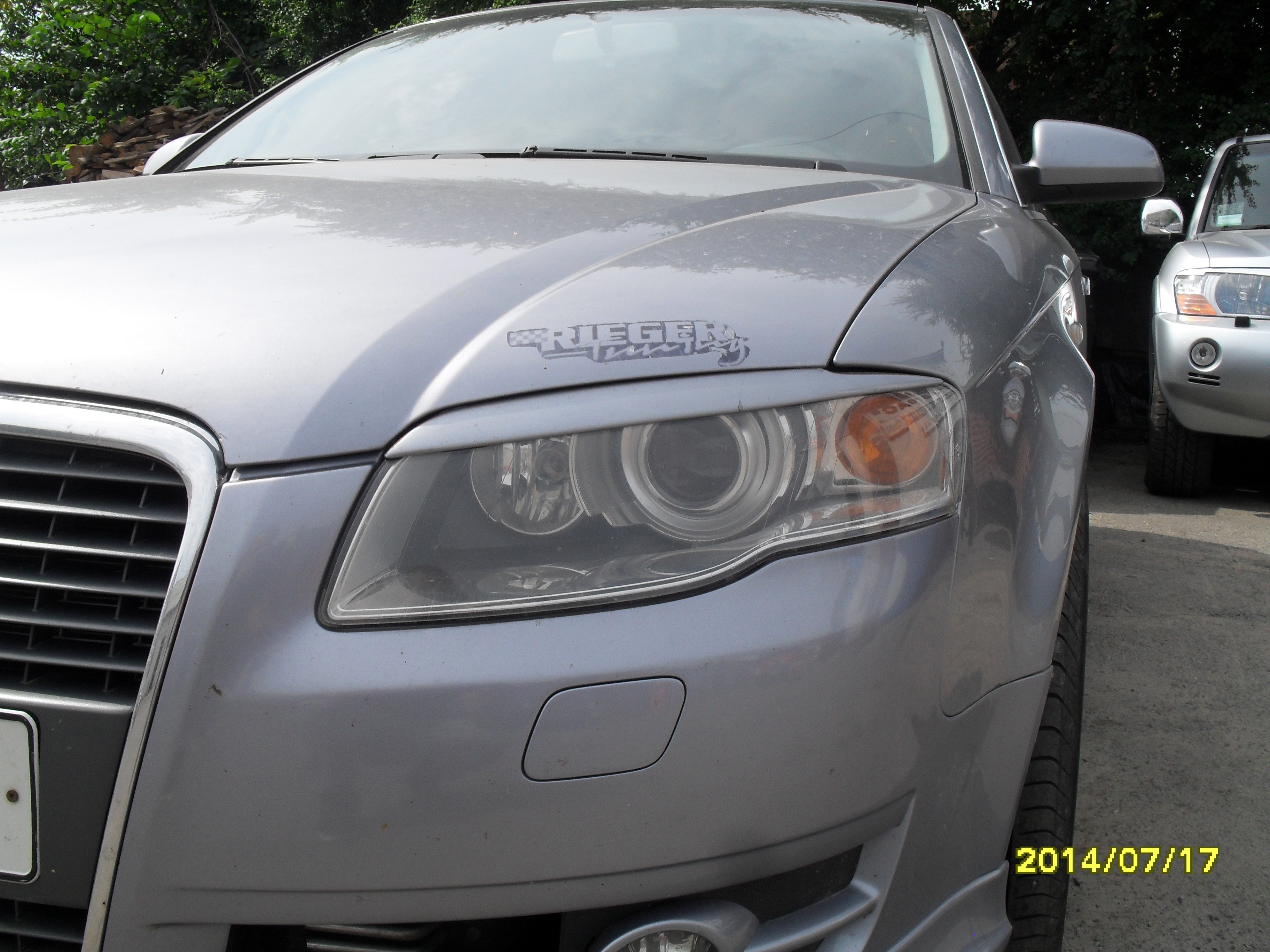 Фара левая би-ксенон с желтым поворотом 8E0 941 029 AT   Audi A4