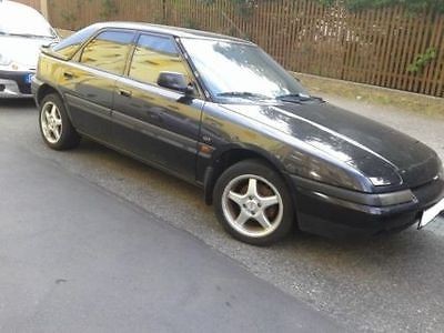 Карта (обшивка) водительской двери под эл. стеклоподъемник Mazda 323  1993 хэтчбек 1.6 Бензин Киев