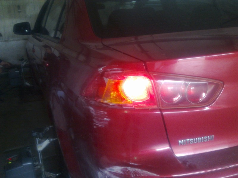 Фонарь задний внешн. левый красный, без патрона Mitsubishi Lancer X  2008 1.5 Бензин Умань
