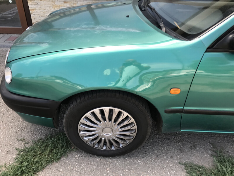 Переднее левое крыло желательно в цвет Toyota Corolla E110  1997 хетчбек 1.3 Бензин 