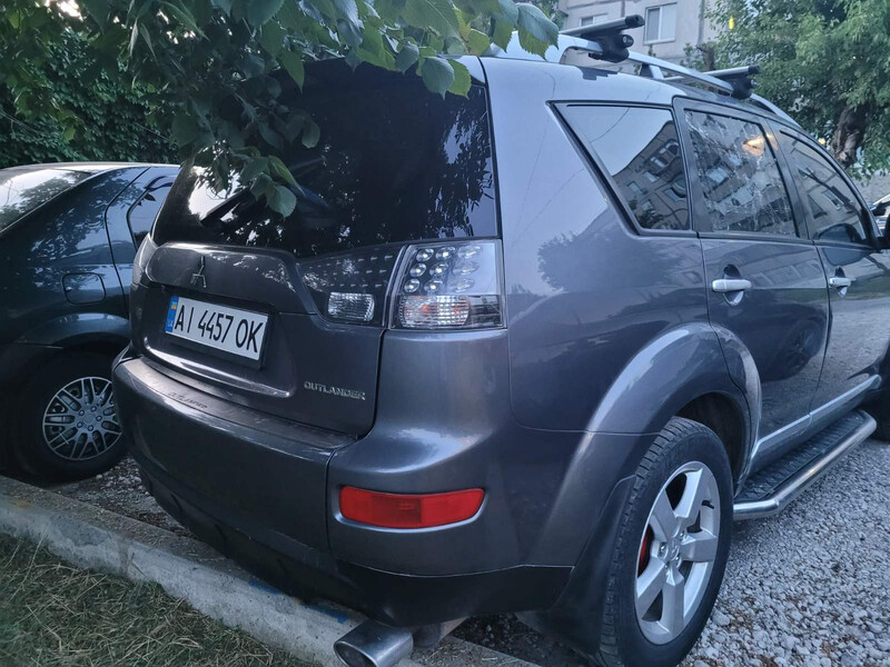 Стекло задней правой двери, б у Mitsubishi Outlander XL  2008 2.4 Бензин Дніпро
