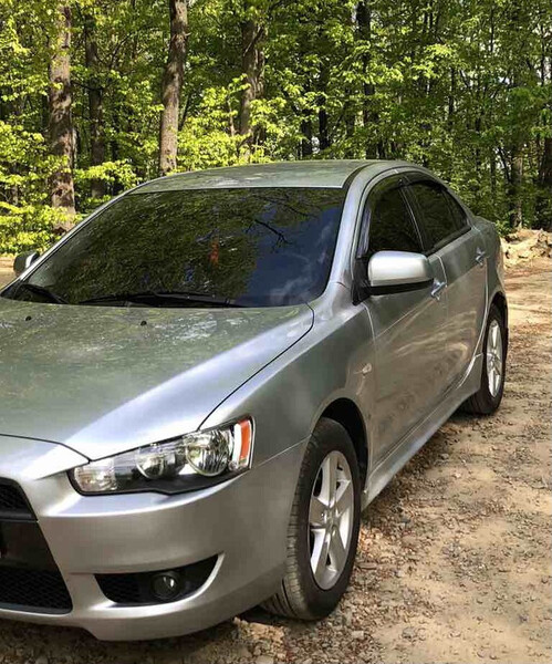 Бампер передній 6400B913HD   Mitsubishi Lancer X