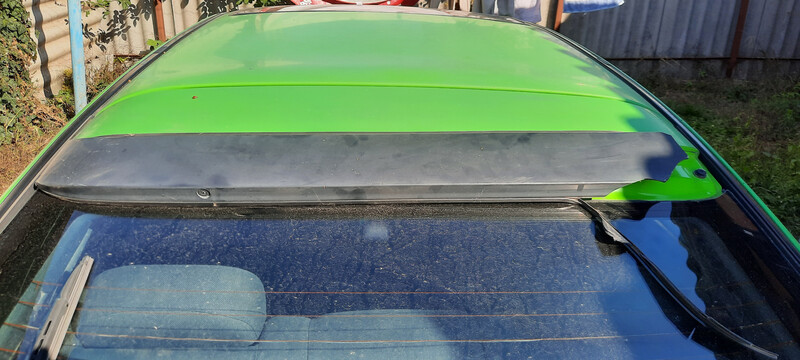 Спойлер крышки багажника верхний Mazda 323  1994 