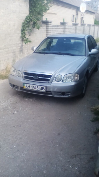 Стекло двери левое Kia Magentis 2004 г.  2.0 л бензин