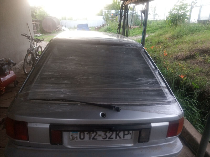 Стекло заднее Nissan Sunny  1990 универсал 1.7 Дизель Хмельницкий