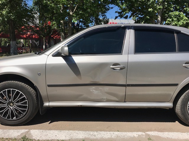 Дверь левая передняя в цвете (серый - 4k) Skoda Octavia 2008 р.  1.9 л дизель Миколаїв